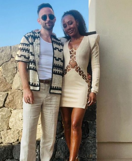 Rory McPhee Instagram Mel B SPICE Girl Mel B looked incredible in a sexy mini dress while cosying up to her fiance Rory McPhee. Credit: Rory McPhee Instagram
