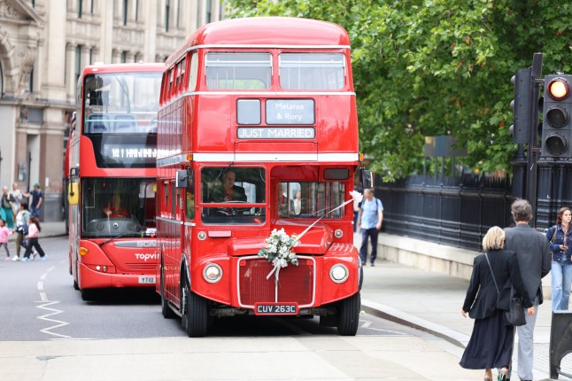 A bus arrives to take guests to the reception at The Shard following the wedding of Spice Girl Melanie Brown, Mel B, to fiance hairdresser Rory McPhee at St Paul's Cathedral, London. Picture date: Saturday July 5, 2025. PA Photo. Photo credit should read: Toby Shepheard/PA Wire