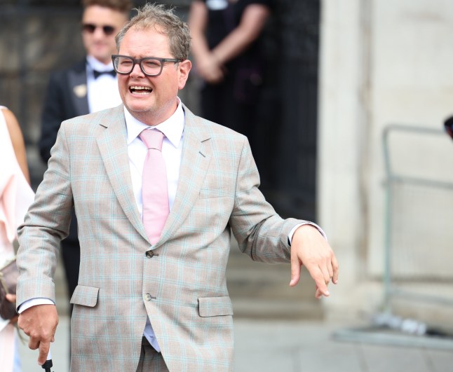 Alan Carr leaves following the wedding of Spice Girl Melanie Brown, Mel B, to fiance hairdresser Rory McPhee at St Paul's Cathedral, London. Picture date: Saturday July 5, 2025. PA Photo. Photo credit should read: Toby Shepheard/PA Wire