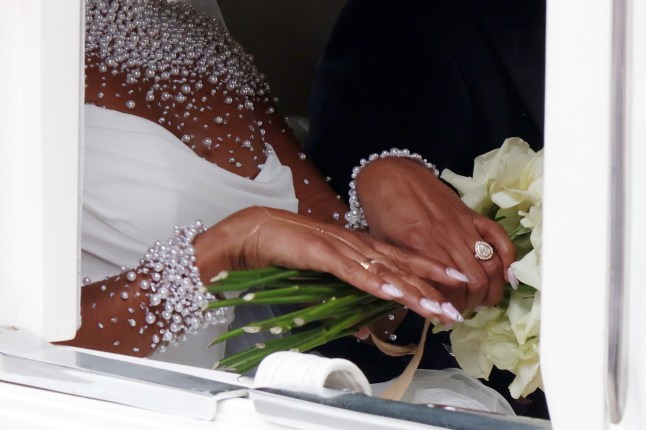 LONDON, ENGLAND - JULY 05: Mel B shows her wedding ring in the carriage outside St Paul's Cathedral on July 05, 2025 in London, England. (Photo by Neil Mockford/GC Images)