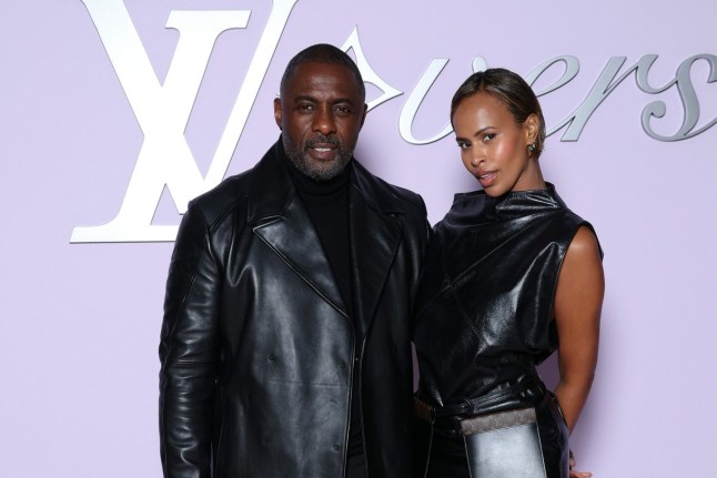 PARIS, FRANCE - JANUARY 21: (EDITORIAL USE ONLY - For Non-Editorial use please seek approval from Fashion House) Idris Elba and Sabrina Dhowre Elba attend the Louis Vuitton Menswear Fall-Winter 2025/2026 show as part of Paris Fashion Week on January 21, 2025 in Paris, France. (Photo by Pascal Le Segretain/Getty Images)