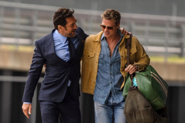 This image released by Apple TV+ shows Brad Pitt, right, and Javier Bardem in a scene from "F1 The Movie." (Apple TV+ via AP)